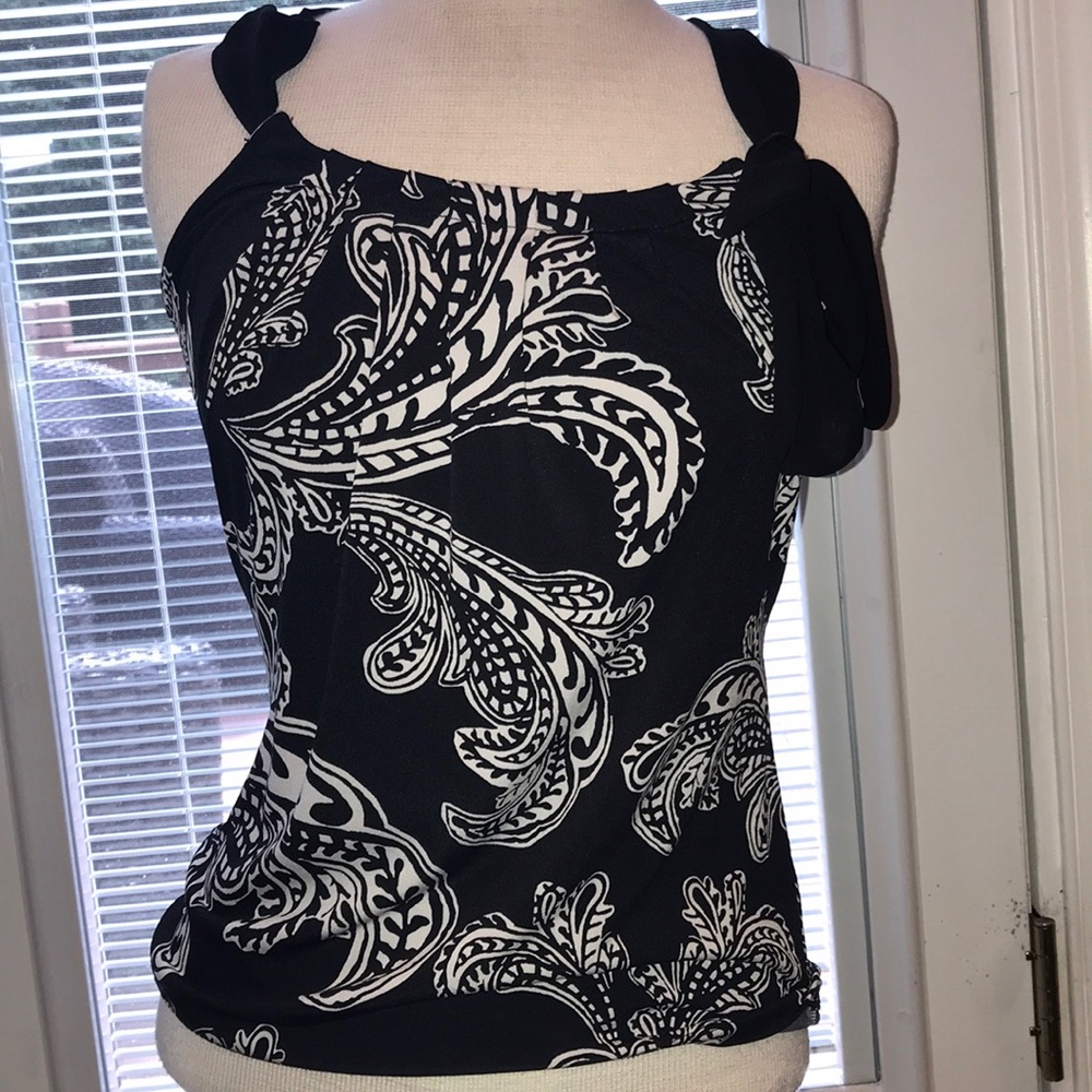 Paisley tank top with ribbon on left shoulder.